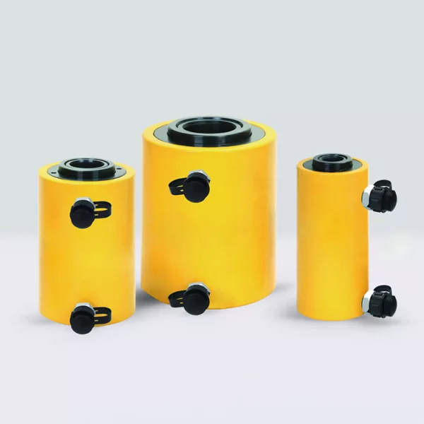 Three yellow Hollow Plunger Hydraulic Cylinder Jack filters of varying sizes on a light background.