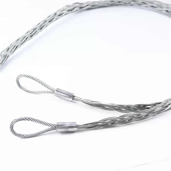 Two metal cable loops with crimped ends and a Cable Sock for Rigging Hardware on a white background.