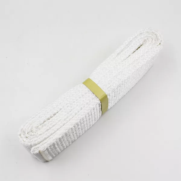 A rolled-up white martial arts belt with a yellow tag, resembling Polyester Flat Endless Webbing Sling.