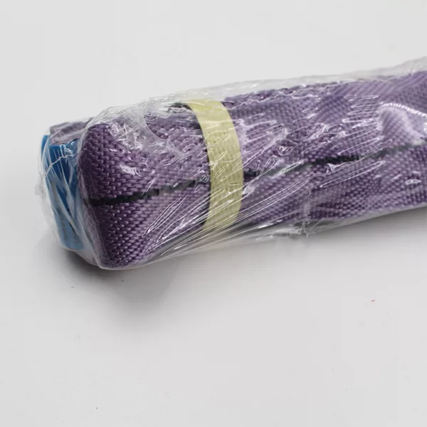 A rolled-up purple yoga mat wrapped in a 1T Synthetic Round Sling.