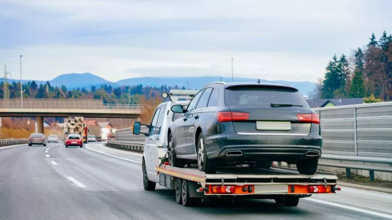 how to tie down car on trailer