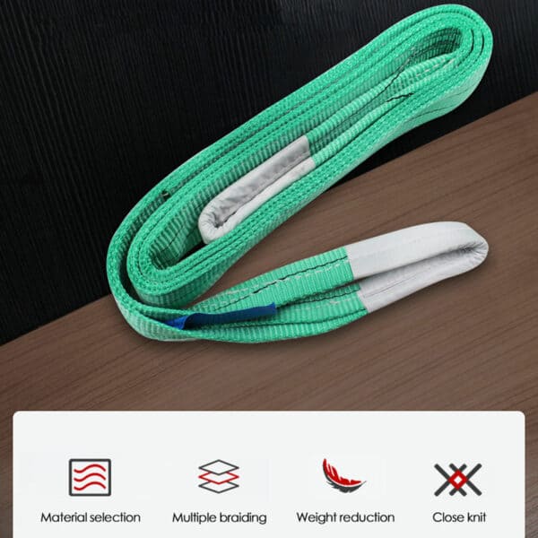 A 2T green polyester flat webbing sling with loops lies on a brown surface. Text icons show its material, braiding, weight reduction, and close-knit design.