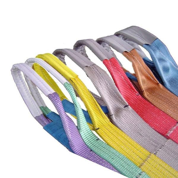 Textile Lifting Slings with flat loops come in various colors arranged in a row, ideal for lifting and rigging.