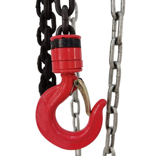 A red metal hook attaches to black and silver chains, forming a durable connection ideal for the Best Manual Chain Hoist.