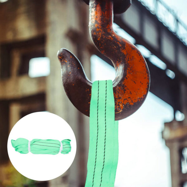 A rusted hook grips the 2 Ton Lifting Sling, a green strap in the inset; a blurred industrial background adds mystery.