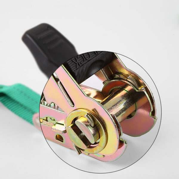 Close-up of a durable metal buckle with green strap, designed for secure fastening.